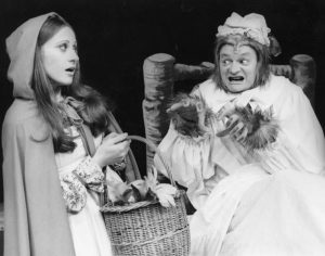Hillie as Red Riding Hood and Bob Hornery as The Wolf in Red Riding Hood at The Thorndike Theatre, Leatherhead